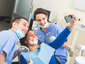 Dental-patient-and-dentist-taking-pictures-Stock-Photo-1.jpg